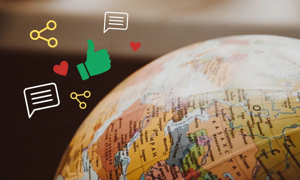 英語を使ってSNSを通して世界が広がるイメージ。地球儀とSNSのアイコン。